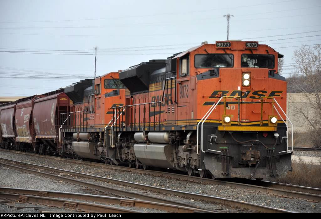 Grain train rolls east